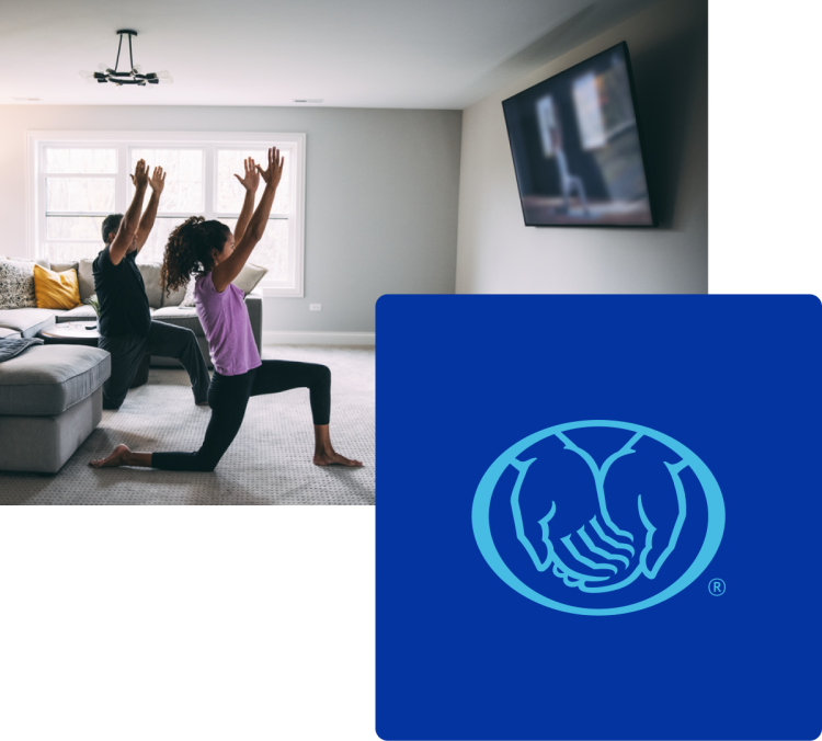 couple doing yoga in living room
